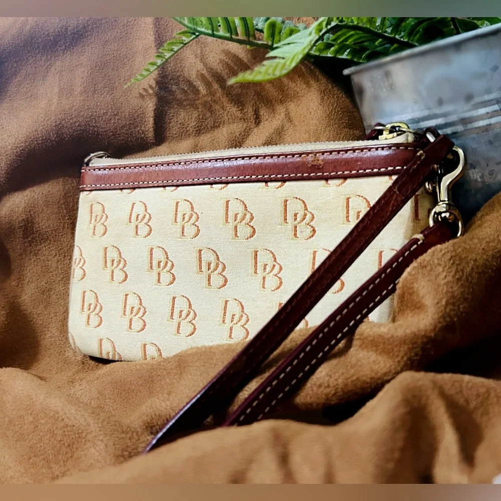 Dooney & Bourke Beige Monogram Wristlet with Brown Trim - Picture 1 of 15